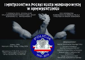 plakat mistrzostw, który przedstawia ręce dwóch osób siłujących się ze sobą