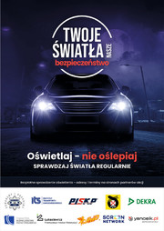 Na zdjęciu plakat z napisem &quot;Twoje światła - nasze bezpieczeństwo&quot;.