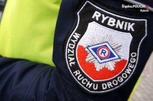 Emblemat Wydziału Ruchu Drogowego Komendy Miejskiej Policji w Rybniku.